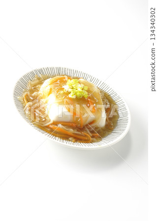 Silken tofu with thick bean paste photographed on a white background Silken tofu with thick bean paste photographed on a white background 134340302