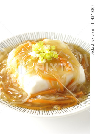 Silken tofu with thick bean paste photographed on a white background 134340305