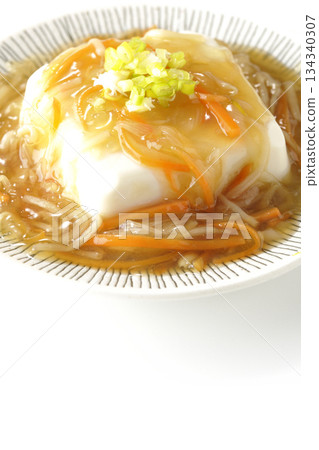Silken tofu with thick bean paste photographed on a white background 134340307