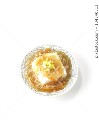 Silken tofu with thick bean paste photographed on a white background Silken tofu with thick bean paste photographed on a white background 134340313