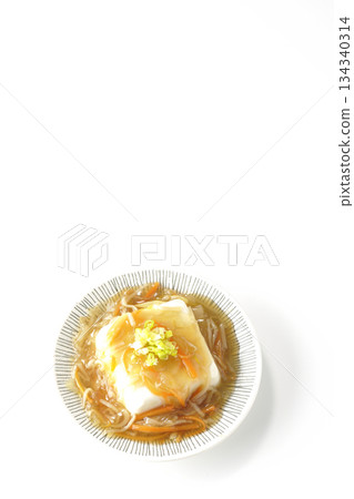 Silken tofu with thick bean paste photographed on a white background Silken tofu with thick bean paste photographed on a white background 134340314