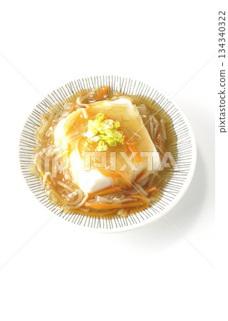 Silken tofu with thick bean paste photographed on a white background Silken tofu with thick bean paste photographed on a white background 134340322