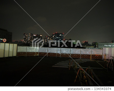 Night view in front of the construction site guardrail Night view in front of the construction site guardrail 134341074