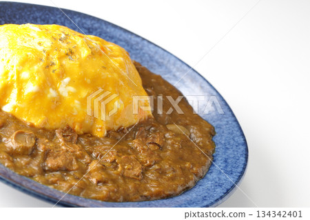 Omelet curry rice photographed on a white background Omelet curry rice photographed on a white background 134342401