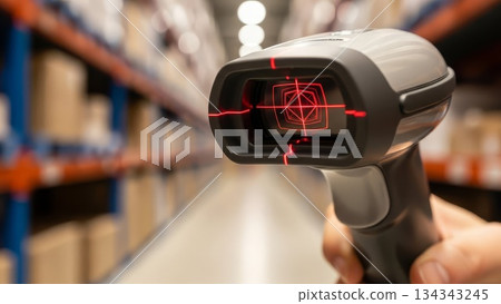 Barcode scanner with red laser targeting system in warehouse distribution center inventory management 134343245