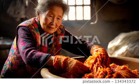 Middle-aged Woman Preparing Traditional Korean Kimchi in a Rustic Kitchen Setting for Authentic Cultural Experience 134343372