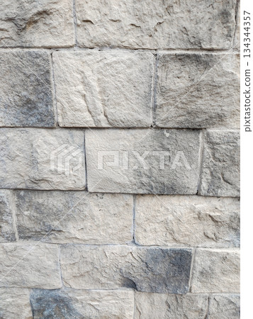 Stone wall texture close up light gray masonry vertical Stone wall texture close up light gray masonry vertical 134344357
