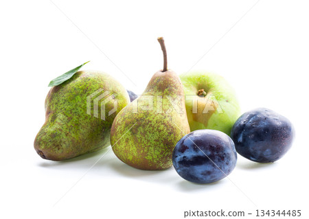 Autumn harvest of ripe pears and blue plums Autumn harvest of ripe pears and blue plums 134344485