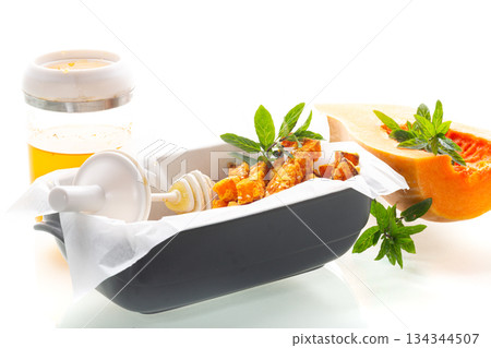 Appetizing vegetarian snack with roasted pumpkin and sesame Appetizing vegetarian snack with roasted pumpkin and sesame 134344507