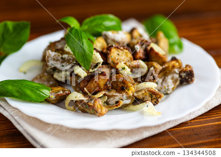 Homemade roasted eggplant salad with onion and herb dressing Homemade roasted eggplant salad with onion and herb dressing 134344508