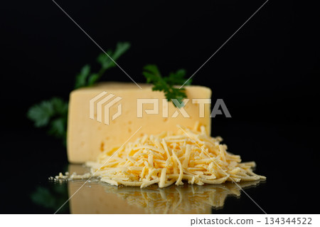 Grated hard cheese and parsley used for healthy meal Grated hard cheese and parsley used for healthy meal 134344522