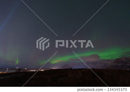 Aurora Borealis in the Icelandic night sky Aurora Borealis in the Icelandic night sky 134345373