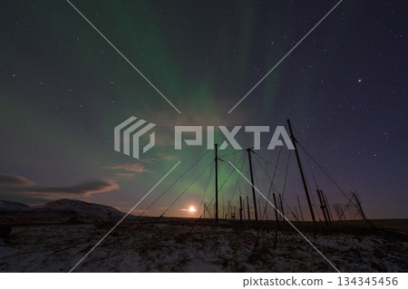 Moonlight and aurora borealis in winter in Iceland Moonlight and aurora borealis in winter in Iceland 134345456