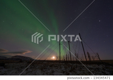 Moonlight and aurora borealis in winter in Iceland 134345471