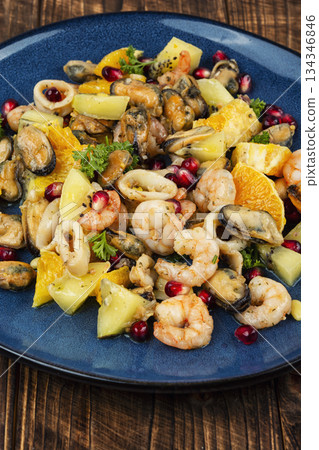 Fresh salad with seafood. 134346846