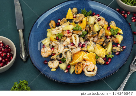 Fresh salad with seafood. 134346847