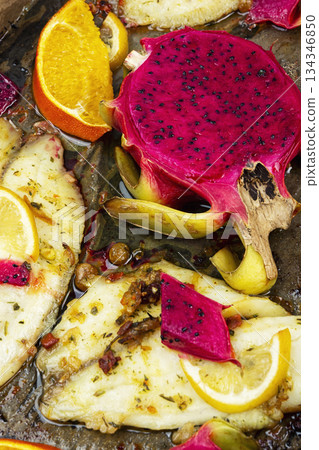 Plate of grilled white fish fillet. 134346850