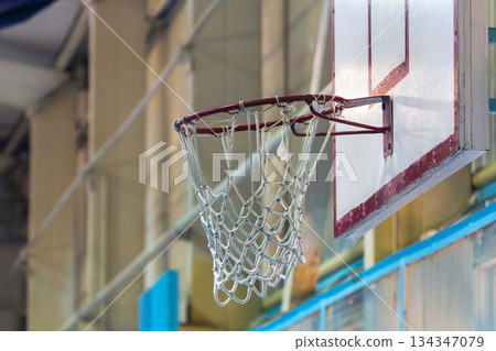 basketball hoop in a gym 134347079