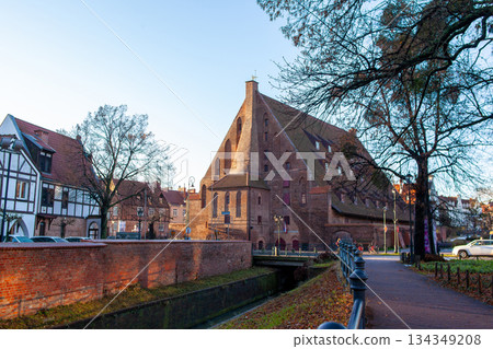 Historic building stands in the town square during a clear day in autumn 134349208