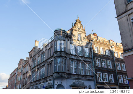 Historic building on city street in bright daylight with clear sky visible Historic building on city street in bright daylight with clear sky visible 134349272