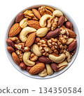 Bowl of mixed nuts isolated on white background 134350584