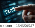 Finger pointing at tariff word on digital screen interface 134350587