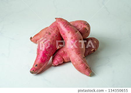 Sweet potato on white background 134350655