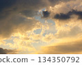dramatic sunset sky with clouds. beautiful nature background in golden evening light. telephoto shot. leadership corporate wallpaper 134350792