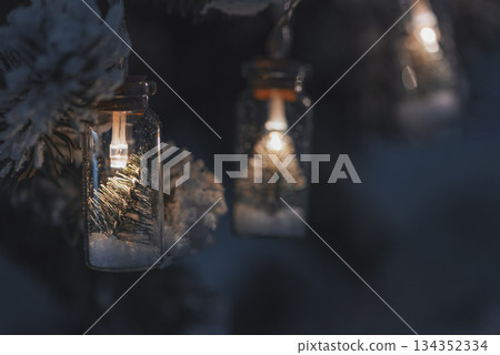 Christmas Tree with Bottle Lights and Miniature Pine Decorations. Soft focus Christmas Tree with Bottle Lights and Miniature Pine Decorations. Soft focus 134352334