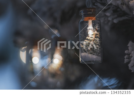 Christmas Tree with Bottle Lights and Miniature Pine Decorations. Soft focus Christmas Tree with Bottle Lights and Miniature Pine Decorations. Soft focus 134352335