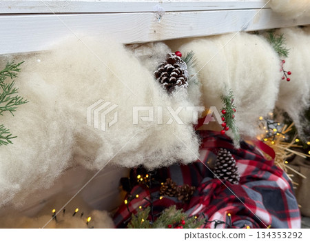 Christmas pinecone decoration with artificial snow on wooden background. Winter holiday symbolism, natural ornament, seasonal coziness, handmade festive atmosphere and rustic Christmas mood Christmas pinecone decoration with artificial snow on wooden background. Winter holiday symbolism, natural ornament, seasonal coziness, handmade festive atmosphere and rustic Christmas mood 134353292