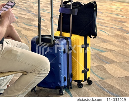 Colorful bright suitcases of tourists at the international airport. Colorful bright suitcases of tourists at the international airport. 134353929