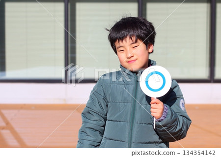 A boy with a whole bill 134354142