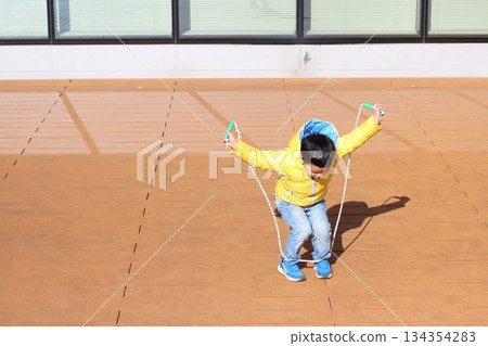 Children playing rope Children playing rope 134354283