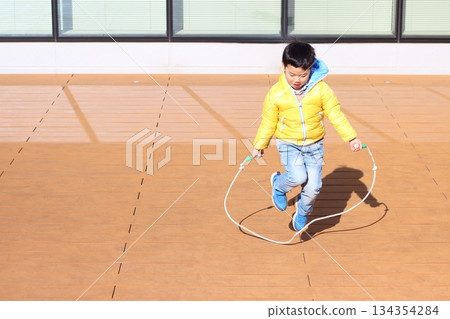 Children playing rope Children playing rope 134354284