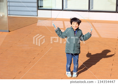 Children playing rope 134354447