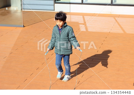 Children playing rope 134354448