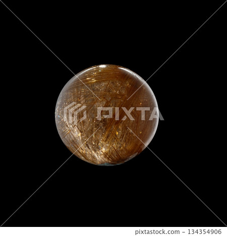 Ball of quartz with rutile on a black background Ball of quartz with rutile on a black background 134354906