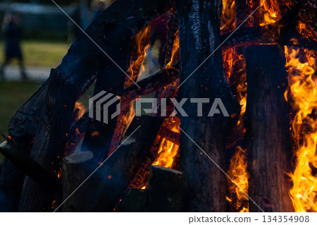 Beautiful fire flames on a campfire Beautiful fire flames on a campfire 134354908