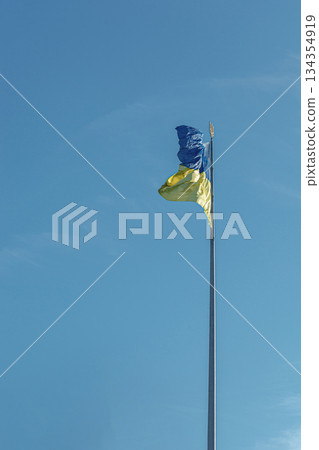 Ukrainian flag against the blue sky 134354919
