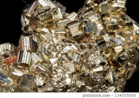 Macro mineral stone Pyrite on a black background 134355050