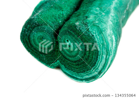 Macro mineral stone malachite stalactite on white background 134355064