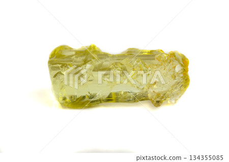 Macro mineral beryl heliodor stone on white background Macro mineral beryl heliodor stone on white background 134355085
