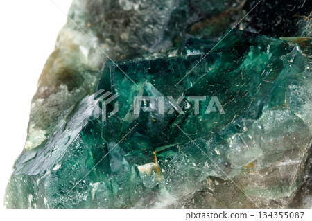 Macro mineral stone Fluorite on a white background Macro mineral stone Fluorite on a white background 134355087