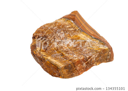 Macro mineral stone Tiger's eye in the breed on a white background Macro mineral stone Tiger's eye in the breed on a white background 134355101