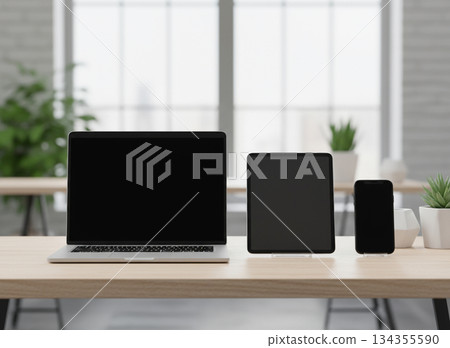 Three-device mockup (laptop, tablet, smartphone) on natural desk background 134355590