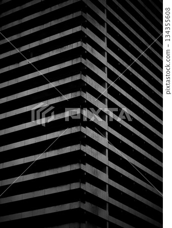Bold brutalist design emphasizing stark contrasts and vertical rhythm Bold brutalist design emphasizing stark contrasts and vertical rhythm 134355608