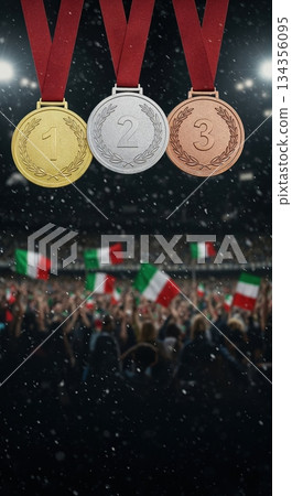 Gold, silver, and bronze medals with laurel wreaths and numbers one, two, and three hang above a cheering crowd waving Italian flags in a stadium under bright lights. 134356095