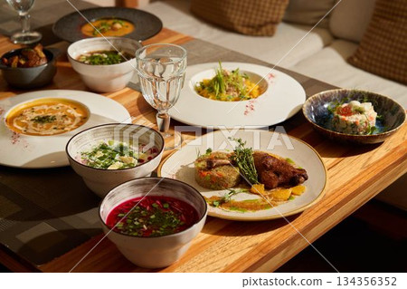Indulge in an Elegant Dining Experience Featuring a Variety of Exquisite Global Dishes 134356352
