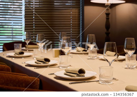 celebratory table with cozy ambiance, intimate anniversary dining with refined decor elements 134356367